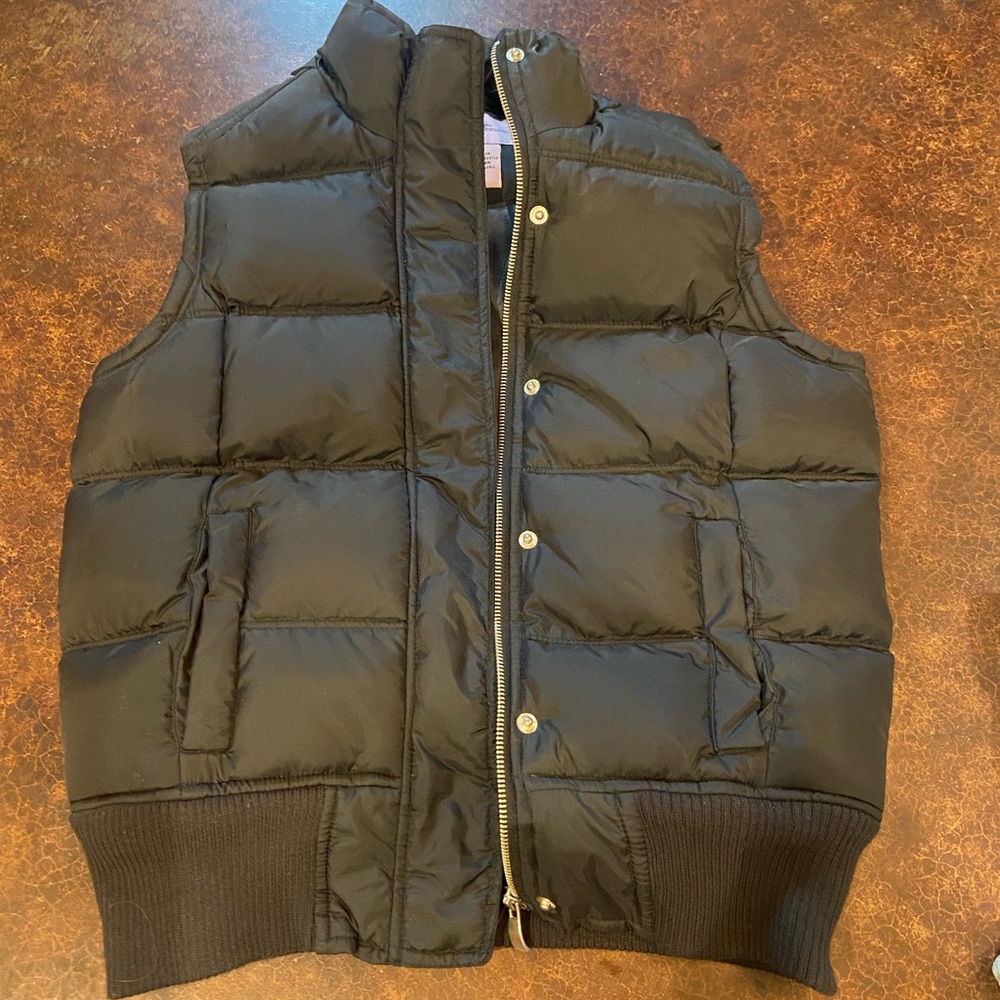 Black puffer vest - fits like a small/medium